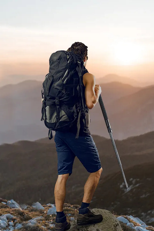 backpacker with Retractable Hiking Pole at Sunset-best hiking poles-collapsible hiking poles-adjustable hiking poles-
trekking poles-best trekking poles-
premium hiking poles-hiking poles for rough terrain-hiking poles for heavy hikers-hiking poles for backpacking-hiking poles with twist locks