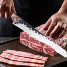 Triple-riveted hardwood handle detail of forged carving knife